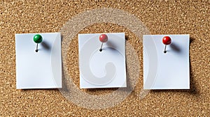 Empty white papers attached with pins to a corkboard, workspace or planning background photo
