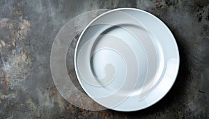 Empty White Plate On Gray Rustic Surface
