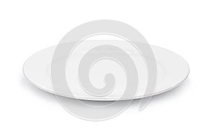 Empty white plate isolated on white