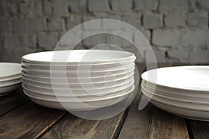 Empty white plate on a wooden loft table