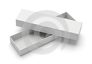 Empty white rectangular box with open lid on white background for packaging and storage purposes