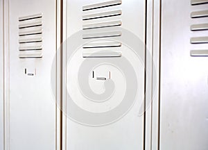 Empty white school metal lockers