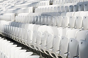 Empty white seats in the stadium before the match