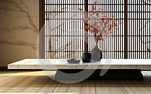 Empty white terrazzo counter table black wood panel in traditional Japanese room shoji window tatami mat floor in sunlight. Asian