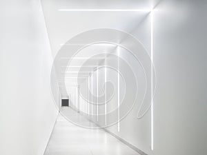 Empty white tunnel with a dark exit at the end