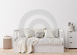 Empty white wall in modern child room. Mock up interior in scandinavian style. Free, copy space for your picture, poster