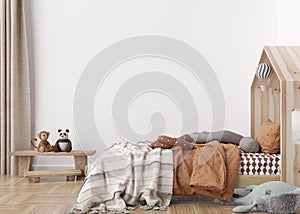 Empty white wall in modern child room. Mock up interior in scandinavian style. Free, copy space for your picture, poster