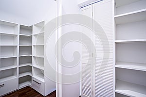 Empty white wardrobe area