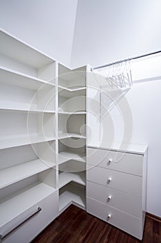 Empty white wardrobe in modern house