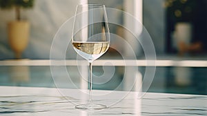 empty white wine glass on table