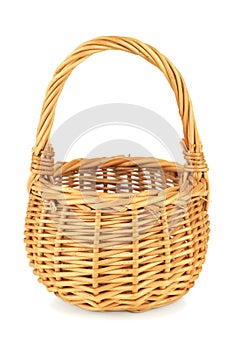 Empty wicker basket on white backgorund photo