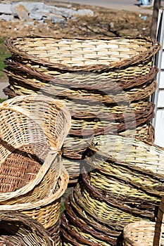 Empty wicker baskets for sale in a market place