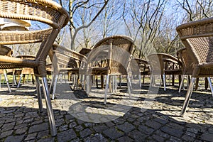 Empty wicker chairs of a cafe on the terrace