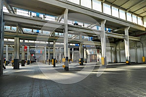 Empty wide industrial plant deserted perspective view