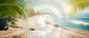 Empty wide Table top wooden bar with blurred beautiful beach scene background coconut leaf on frame for product display mockup