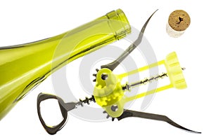 Empty wine bottle with corkscrew and cork