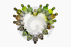 Empty wine bottles heart shape, white background