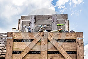 Empty wine bottles stacked in wine boxes