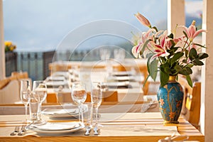 Empty wine glass on dining table in restaurant