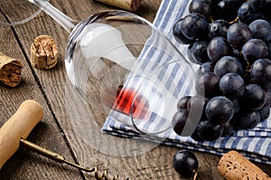 Empty wine glass on wooden table