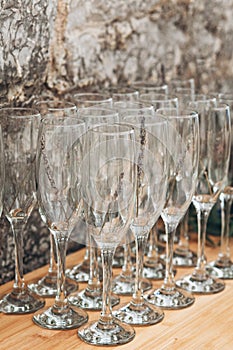 Empty wine glasses in a row.