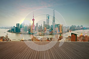 Empty wood floor with bird-eye view at Shanghai bund Skyline