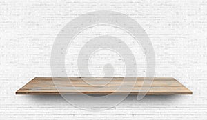 Empty wood plank shelf at white brick wall pattern background