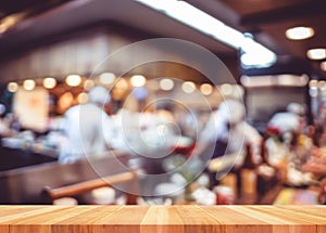 Empty wood table with blur restaurant background,Mock up Template for display of product