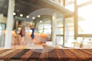 Empty wood table and Blurred background : Customer at coffee shop blur background with bokeh, display montage for product