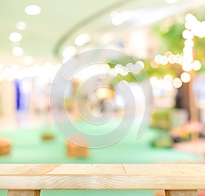 Empty wood table and blurred cafe light background. product disp