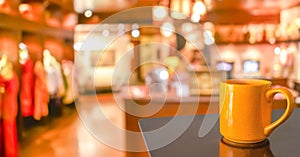 Empty wood table and Coffee shop blur background with bokeh image