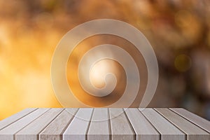 Empty wood table shelf and blurred brown wall background. Product display template.