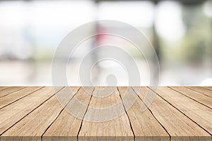 Empty wood table top on blurred background,space for montage pro