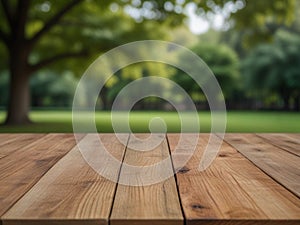Empty wood table top and blurred green tree in the park garden background - can used for display or montage your products