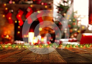 Empty wood table top on blurry bokeh Christmas tree and news year decoration. Concept Christmas time for web banner , display or