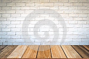 Empty wood table top and brick background with copy space.