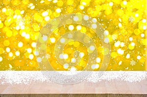 Empty wood table top on gold bokeh light christmas background