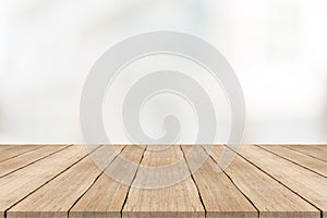 Empty wood table top on white blurred background