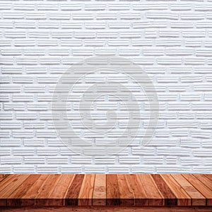 Empty wood table with white brick wall background
