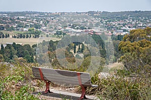 Empty wooden bench on nature lookout, view point