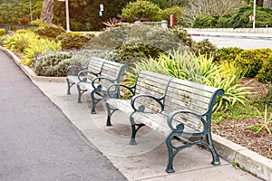 Empty wooden benches in a public park