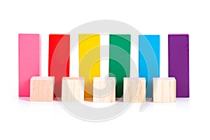 Empty wooden block and colorful wooden block on white background. For product display montage or design layout