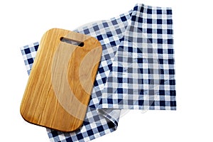 Empty wooden board for food and tablecloth on white background isolated top view