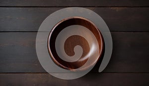 Empty Wooden Bowl on Rustic Dark Table Top View, Copy Space