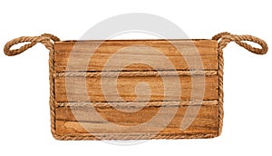 Empty wooden box with rope handles on white