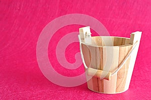 An empty wooden bucket