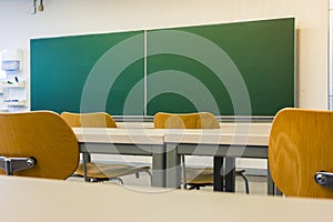 Empty Wooden Chairs at Tables Depth of Field Lecture Hall Nobody