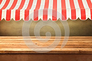 Empty wooden counter with awing