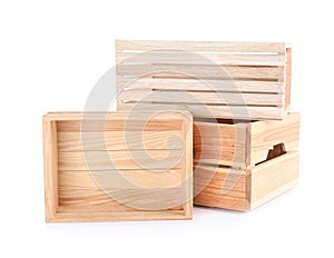 Empty wooden crates stacked and isolated