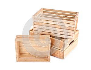 Empty wooden crates stacked and isolated